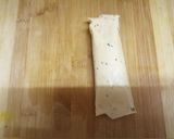A picture of step 9 of Papad Rolls.