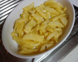 Foto del paso 5 de la receta: Patatas fritas con queso y pavo al horno