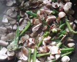 A picture of step 3 of Garlic mushroom fried rice.