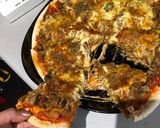 A picture of step 10 of Tuna pizza.