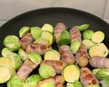A picture of step 1 of Pig in Blankets and Brussel sprouts with sweet plum sauce.
