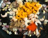 A picture of step 2 of Chingri diye Masoor Dal Er Khichuri (Prawn Khichdi - Bengali Style).