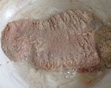 Foto del paso 2 de la receta: Milanesa a la napolitana con cebollas caramelizadas