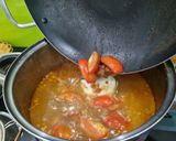 A picture of step 2 of Bún Riêu Cua (Vietnamese Crab Noodle Soup with Imitation Crab Cakes).