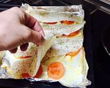 Foto del paso 4 de la receta Merluza al horno con rodajas de tomate y revuelto de espinacas