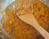 Foto del paso 5 de la receta: Estofado de alcachofas, almejas y langostinos