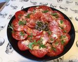 Une image de l'étape 6 de Salade de tomates cœur de bœuf,parmesan,fleurs et feuilles de basilic.
