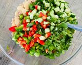 A picture of step 4 of Mediterranean giant couscous salad.