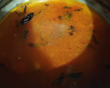 A picture of step 4 of Colourful Stringhoppers with Crab stew.