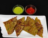 A picture of step 5 of Veggie loaded moong dal chilla.