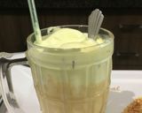 A picture of step 2 of Mango shake with ice cream.