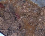 A picture of step 5 of Meat with dry whole spices.