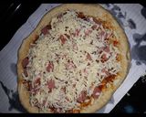 A picture of step 3 of Sausage pizza.