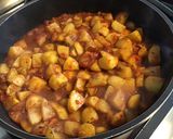 Une image de l'étape 9 de Pommes de terre sautées aux tomates, ail et épices.