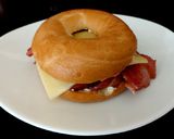 A picture of step 4 of My Smoked Streaky Bacon Bagel With Cheese 🥰.