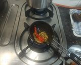 A picture of step 13 of Punjabi Kadhi Pakoda.