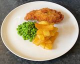 A picture of step 7 of German pork schnitzel.