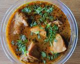 A picture of step 7 of Chicken curry.