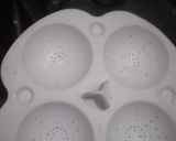 A picture of step 3 of Steamed Pitha in microwave oven.