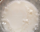 Foto del paso 5 de la receta: Mangos 🥭 rellenos de mousse de coco 🥥