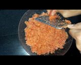 A picture of step 1 of Gajar ka halwa with coconut milk.