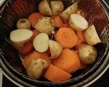 A picture of step 1 of Maple garlic chicken with crispy potatoes and steamed carrots.