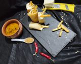 A picture of step 12 of Paneer fries cheese loaded dosa.