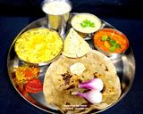 A picture of step 5 of Gujarati Thali - Bajara Rotlo - Lasooni Aloo Sabzi - Khichdi - Kadhi (Dinner).