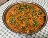 Une image de l'étape 28 de Poulet aux cacahuètes, carottes, tomates et épices.