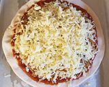 A picture of step 12 of Completely homemade chicken madras pizzas.