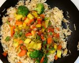 A picture of step 8 of Thai Pineapple Fried Rice.