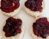 A picture of step 2 of My Afternoon Tea open Scones with Cherry Jam and Clotted Cream.