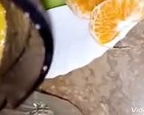 A picture of step 3 of Kiwi n orange juice.