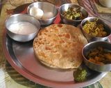 A picture of step 3 of Traditional thali of bihar.