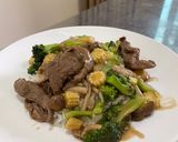 A picture of step 6 of Beef in gravy sauce over rice.