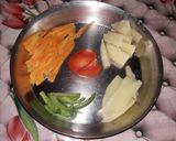 A picture of step 1 of Veg clear soup with sliced boiled egg.