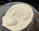 A picture of step 10 of Paneer Butter Masala with Tandoori Naan.