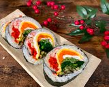 A picture of step 6 of Rainbow Roll Sushi.