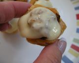 A picture of step 4 of Meatball Marinara Bites.