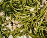 A picture of step 5 of Zucchini Spaghetti with Basil Pesto, Crumbled Feta, Almonds, and Pine Nuts.