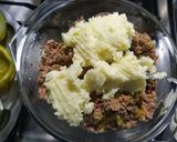 Foto del paso 3 de la receta: Zapallitos, papas y cebollas rellenos