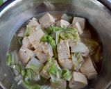 Foto langkah ke 4 dari resep Tumis Tahu Sawi Putih.