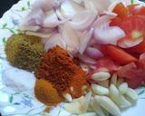 A picture of step 1 of Aloo Gosht.