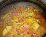 A picture of step 4 of Cabbage Carrots peas & potato vegetable.