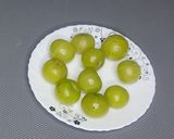 A picture of step 1 of Amla Ki Launji (amla and jaggery).