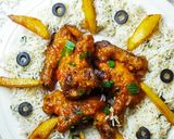A picture of step 4 of Buffalo hot wings with fried spring onions rice.
