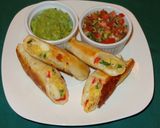A picture of step 3 of Scrambled Egg and Pepper Flautas.
