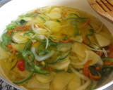 Foto del paso 2 de la receta: Doradas a la espalda con patatas y pimientos en pelotón