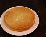 A picture of step 25 of White Layer Cake with a Raspberry Swirl Cheesecake center layer and a Raspberry Cream Frosting.