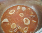 Foto del paso 6 de la receta: Calamares guisados con gambas y guisantes